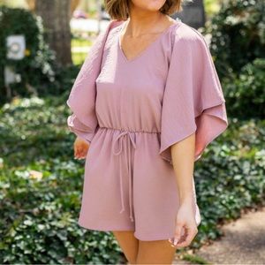 Mauve boutique romper size medium.